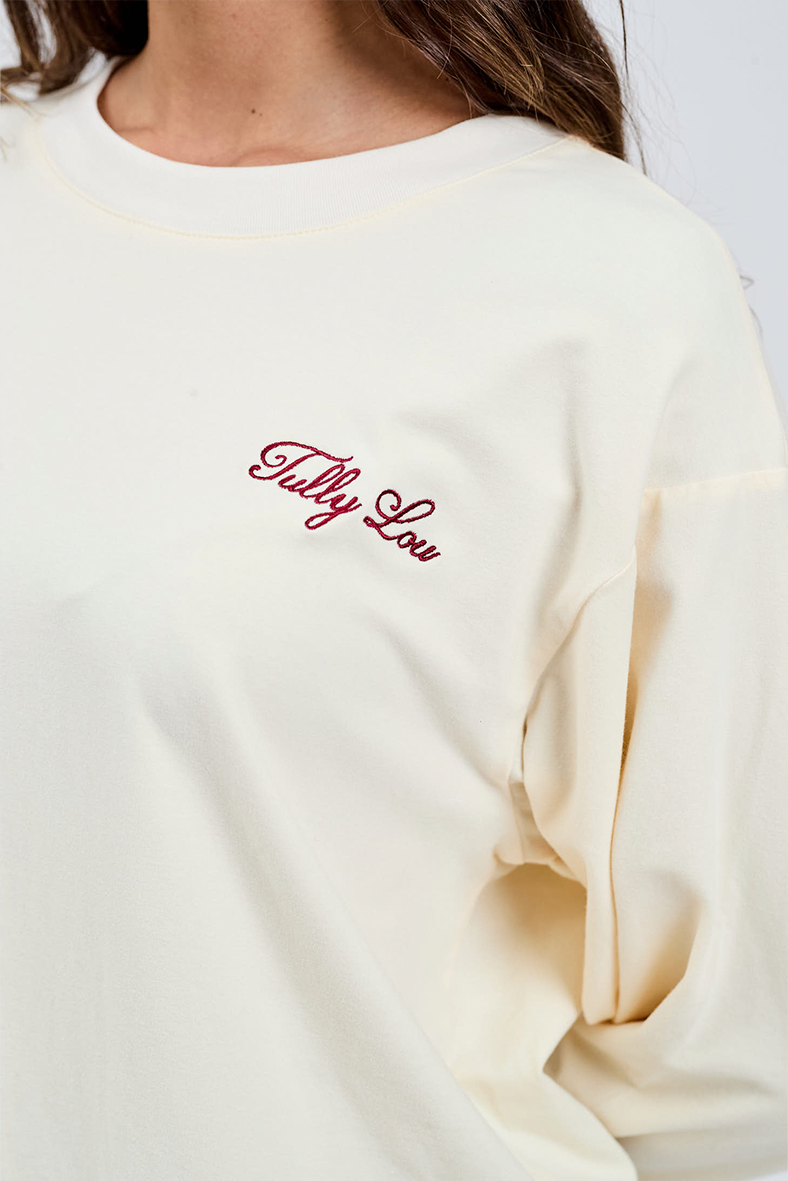 burgundy italic embroidery Tully Lou on long sleeve butter yellow cotton top