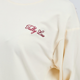 burgundy italic embroidery Tully Lou on long sleeve butter yellow cotton top