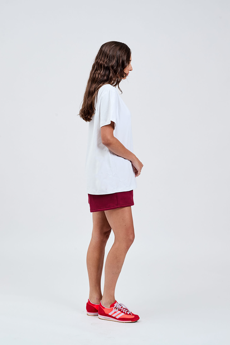 right hand side burgundy cotton shorts with white tee