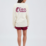 butter cream cotton long sleeve crew with burgundy ciao logo printed on the back with burgundy shorts