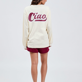 butter cream cotton long sleeve crew with burgundy ciao logo printed on the back with burgundy shorts