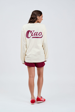 butter cream cotton long sleeve crew with burgundy ciao logo printed on the back with burgundy shorts