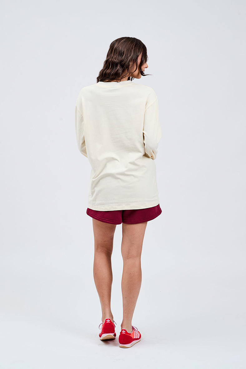 butter yellow long sleeve top back with burgundy shorts