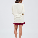 butter yellow long sleeve top back with burgundy shorts