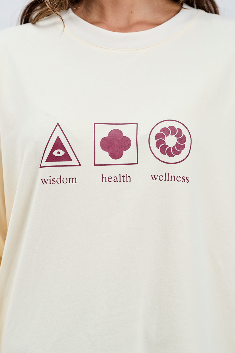 close up of logo burgundy on butter cotton wisdom health and wellness