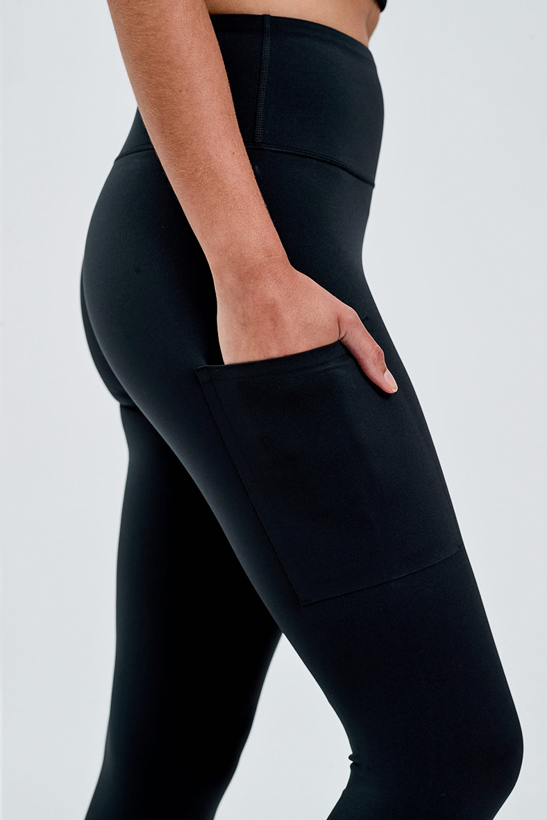 bonded invisible pocket black leggings with hand in pocket 