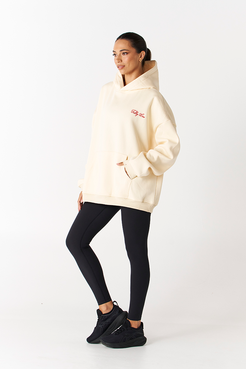 fairfax butter yellow oversized winter hoodie with black Tully lou leggings activewear style