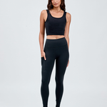 front view black wide waistband leggings with hand in invisible bonded pocket