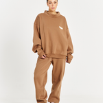model front e come image wearing mocha brown jumper and matching trackpants