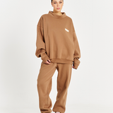 model front e come image wearing mocha brown jumper and matching trackpants