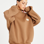 model close up of neck of mocha brown jumper 