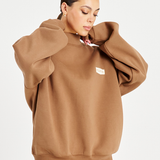 model close up of neck of mocha brown jumper 