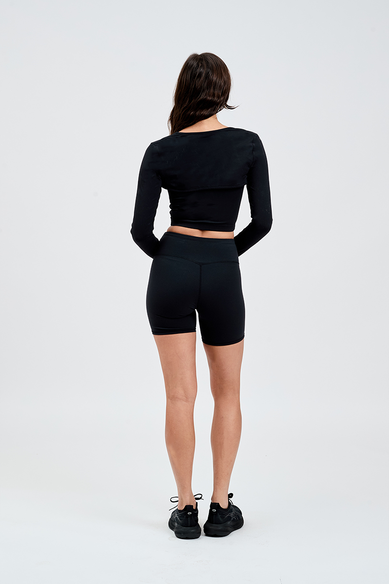 Back black pilates shrug long sleeve with matching black bike shorts