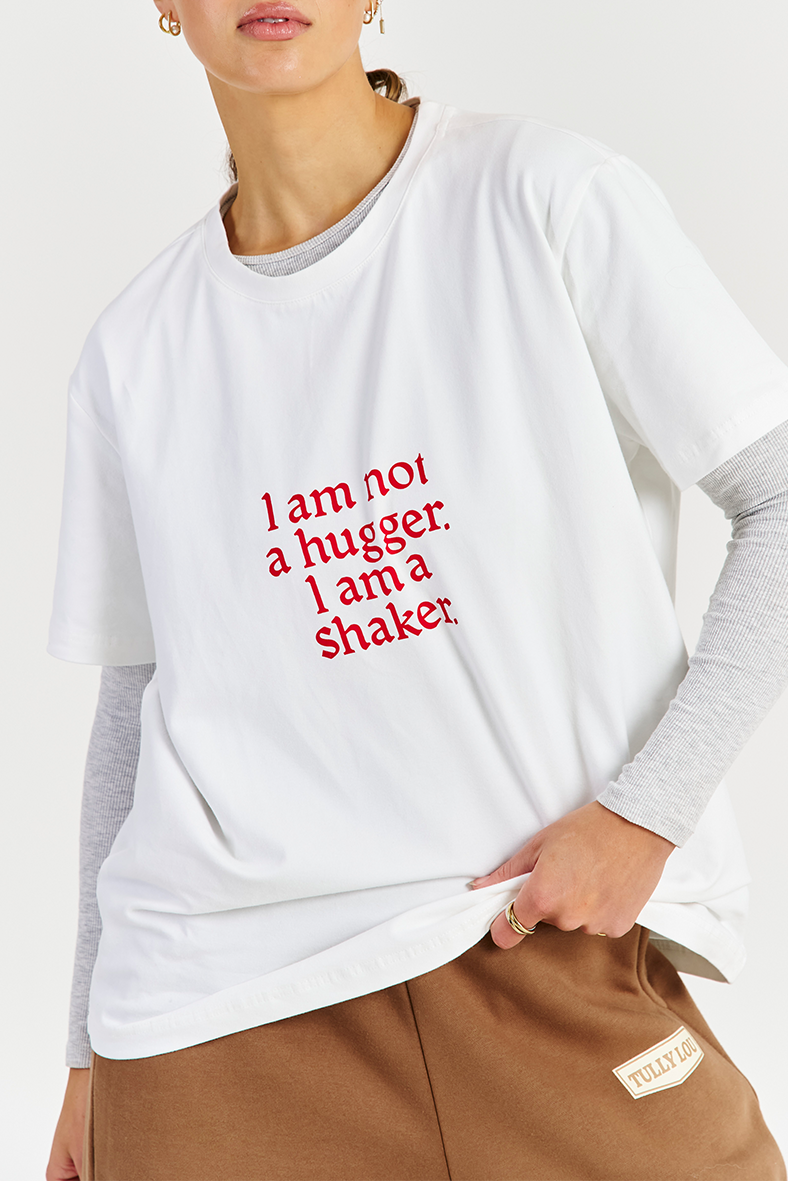white cotton tee with red logo layered with grey top