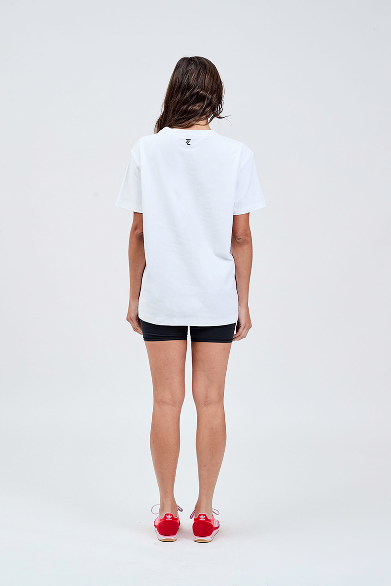 white cotton tee with black logo centre back neckline with black bike shorts