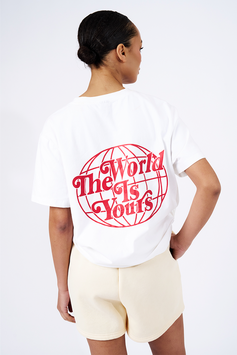 red logo on white crew neck tee heavy weight cotton saying the world is yours