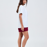 right side white cotton weight tee with burgundy shorts