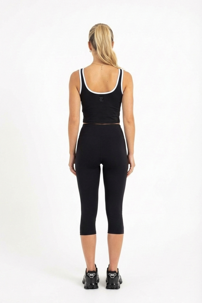 Model wearing Pasadena sculpted crop with capri compression leggings