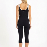 Model wearing Pasadena sculpted crop with capri compression leggings