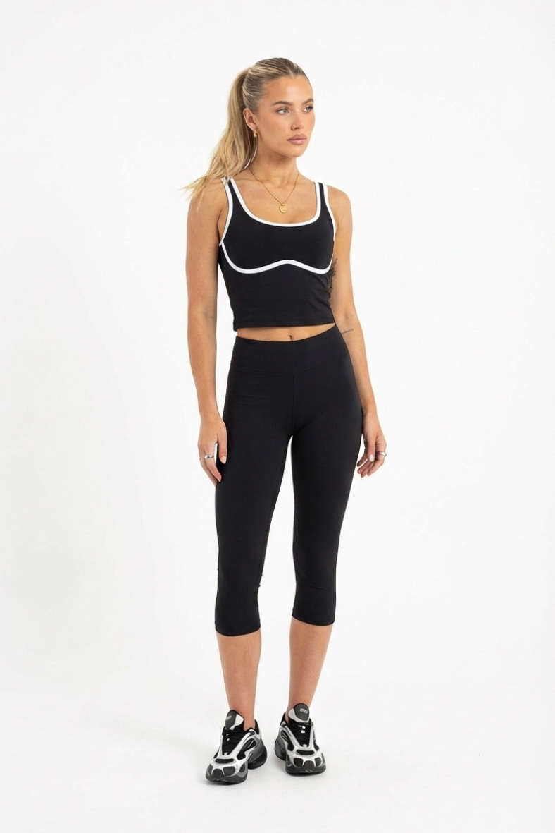 Pasadena sculpted black crop top with contrast white piping with capri leggings and nike shoes